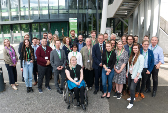 A picture of the symposium participants in front of the Med Uni Graz campus